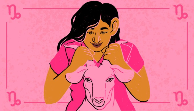 A cheeky image of a woman of color with dark hair holding a pink goat by the horns. The background is pink and her shirt is darker pink.