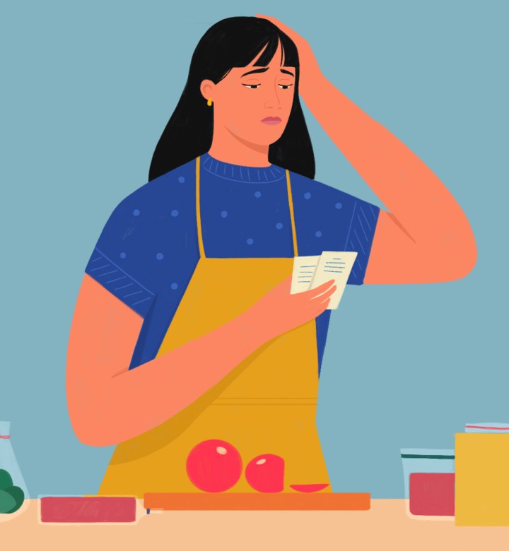 are meal kits convenient or stressful: illustration of someone reading a recipe at a kitchen counter confused