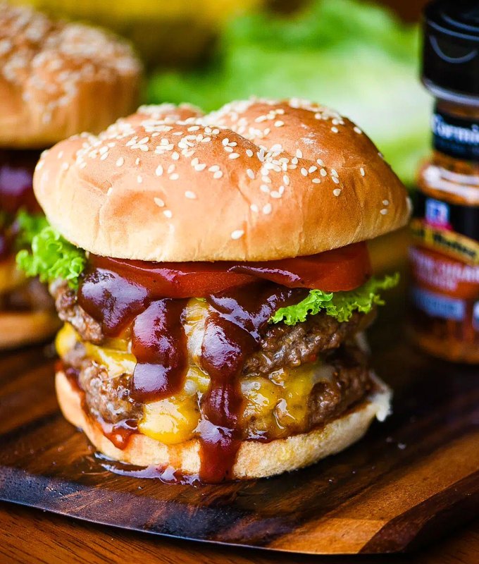best burger recipes: double bbq cheddar burgers on a cutting board