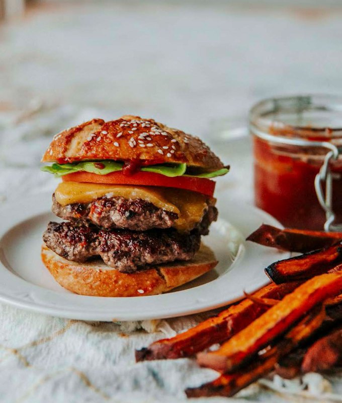 best burger recipes: sweet laurel burger with sweet potato fries on a plate