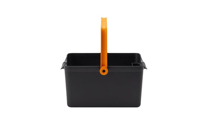 best-gardening-gifts: a black caddy with an orange handle.