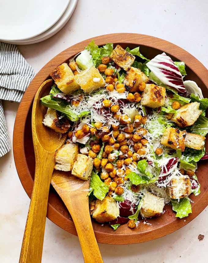 easy dinner recipes: large serving bowl of chickpea caesar salad on a table