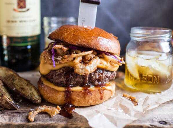 easy Irish recipes: jameson whiskey blue cheesee burger with guinness cheese sauce and crispy onions
