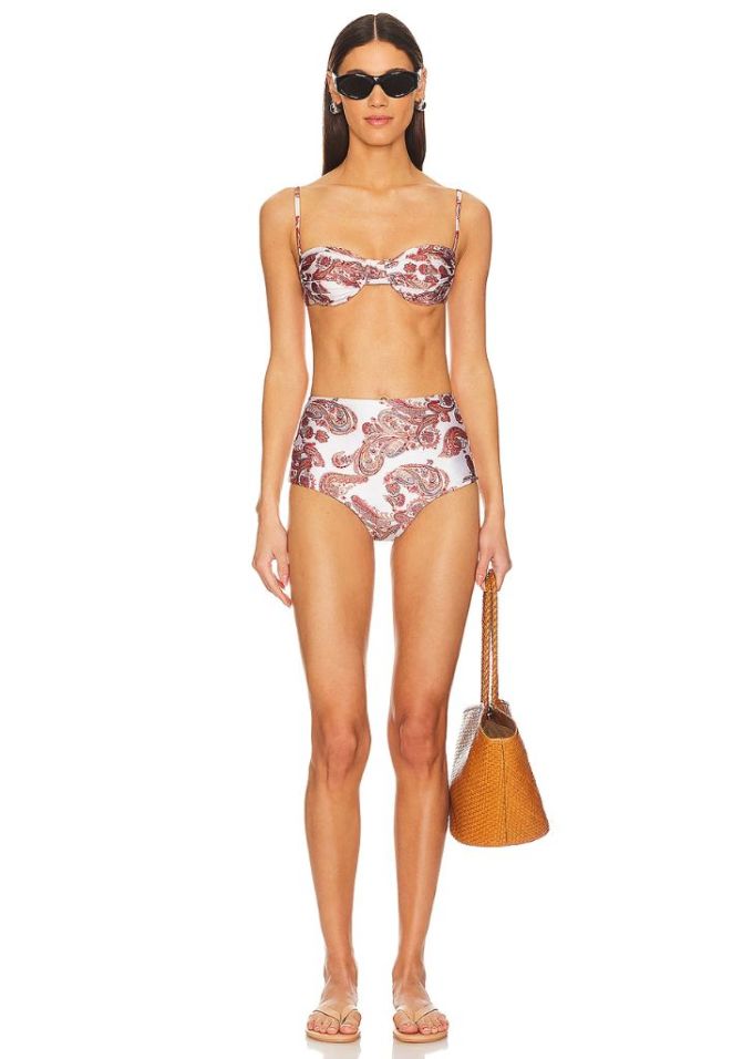 Brunette woman wearing paisley bikini