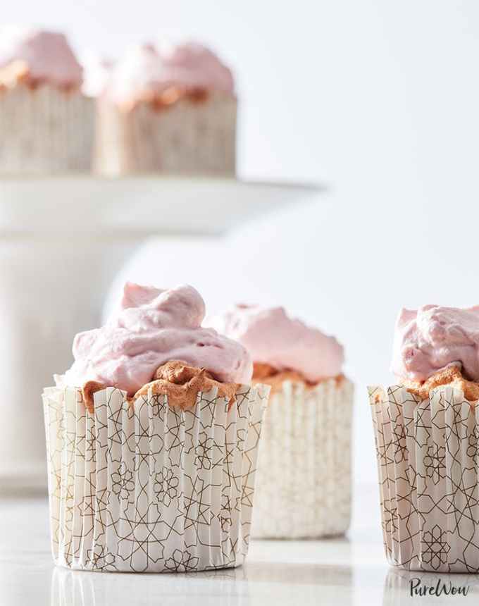 fun things to bake: angel food cupcakes topped with pink raspberry frosting