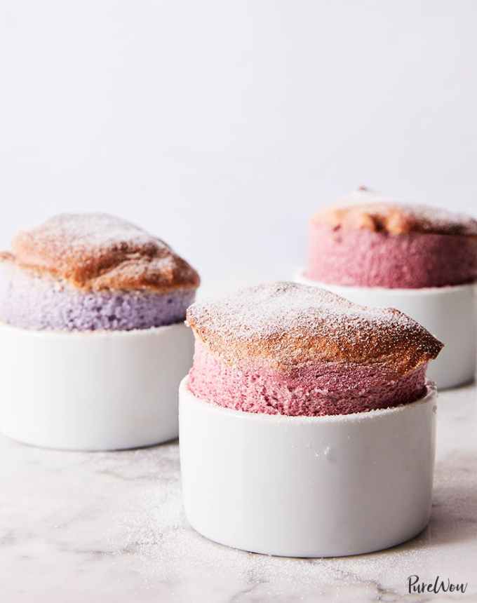 fun things to bake: three berry souffles in ramekins, two pink and one blue