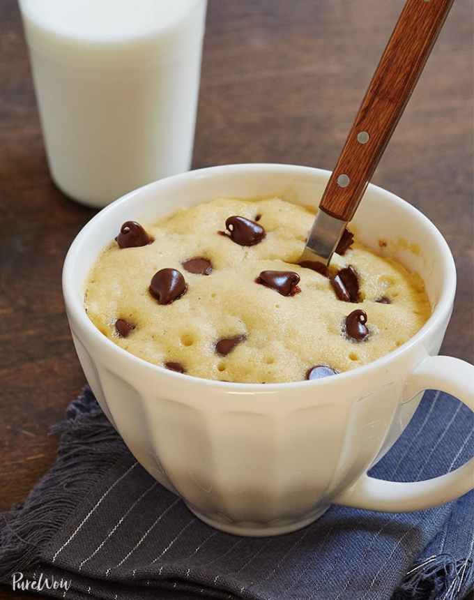 fun things to bake: mug chocolate chip cookie with a spoon and a glass of milk