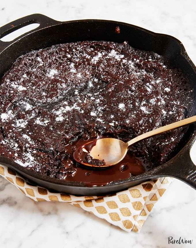 fun things to bake: gooey chocolate skillet cake with a spoon in it