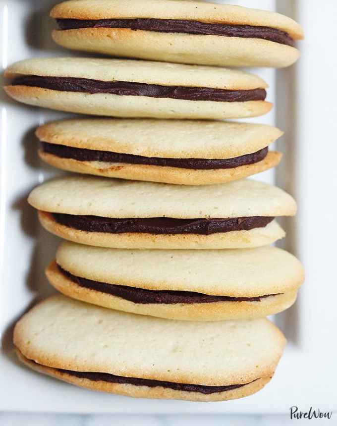 fun things to bake: aerial of six homemade milano cookies on a plate