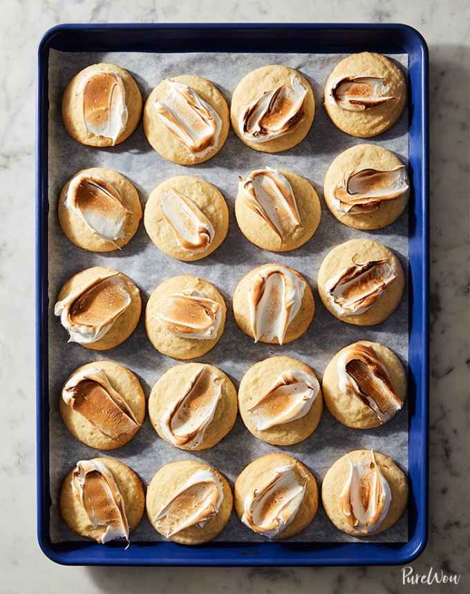 fun things to bake: aerial of lemon meringue cookies on a lined baking sheet