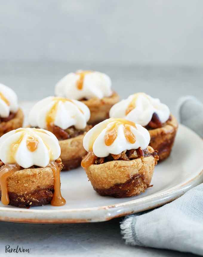 fun things to bake: mini caramel pecan pies with cinnamon roll crust on a plate