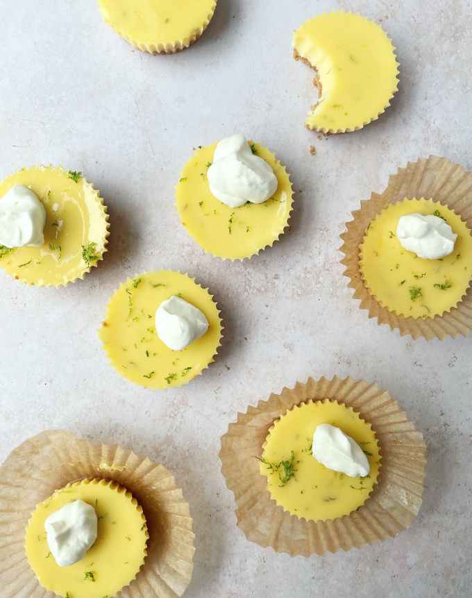 fun things to bake: aerial of mini key lime pies topped with whipped cream