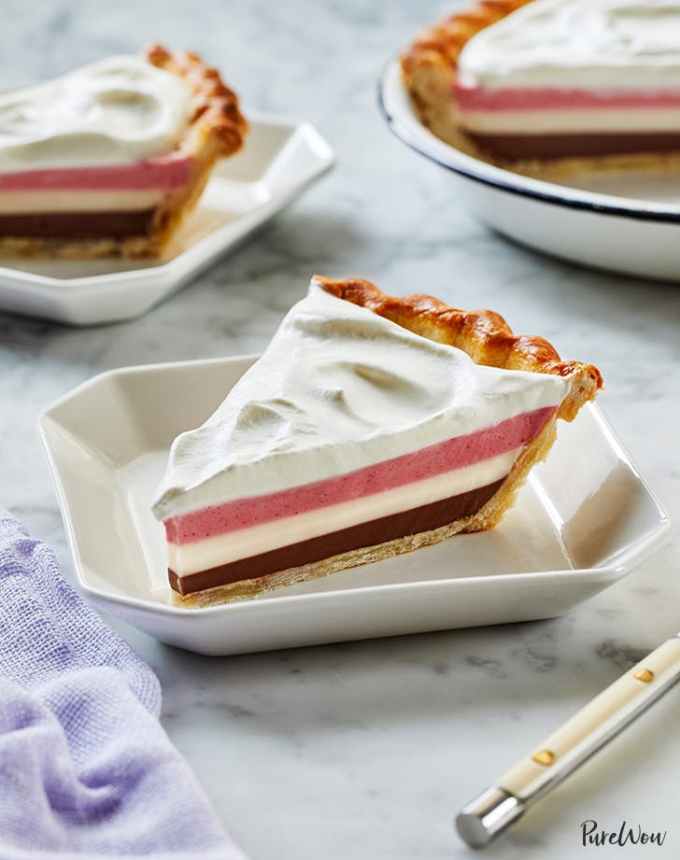 fun things to bake: three slices of neapolitan pie with strawberry, vanilla and chocolate layers, topped with whipped cream