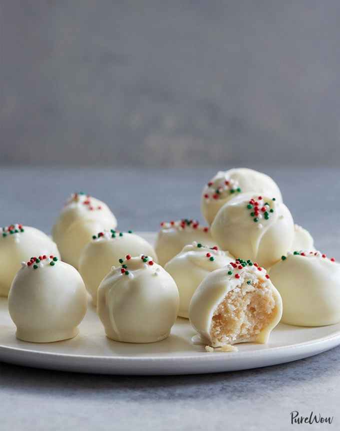 fun things to bake: no-bake sugar cookie truffles topped with sprinkles on a plate