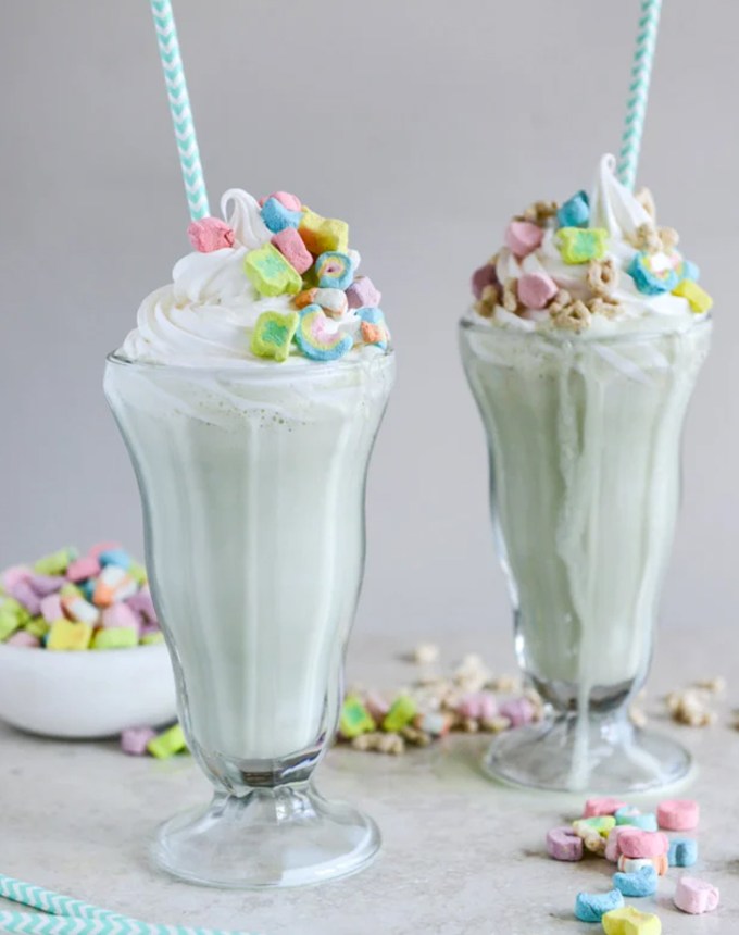 st patrick's day desserts: boozy lucky charms cereal milkshakes with marshmallow frosting