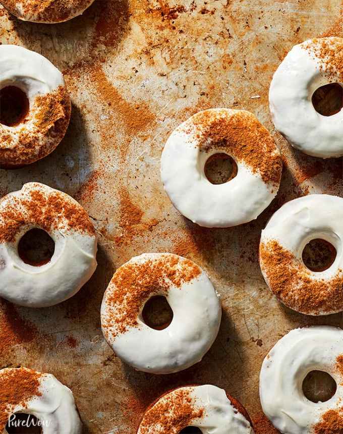 st patrick's day desserts: carrot cake doughnuts with cream cheese glaze