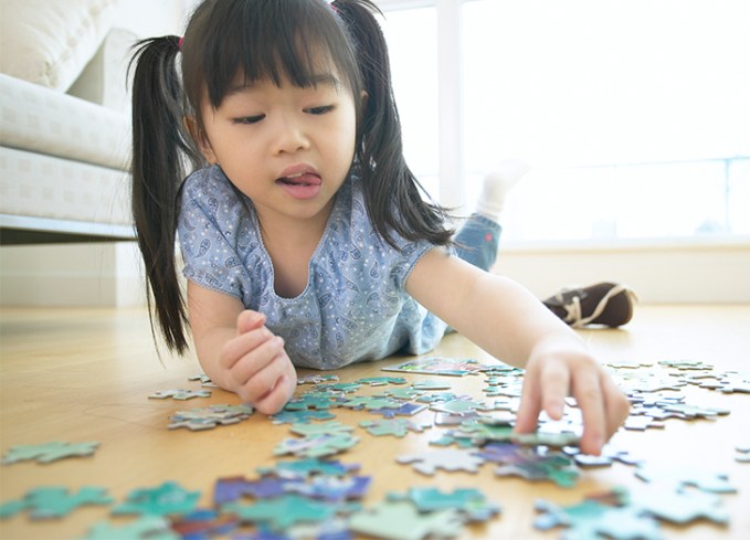 summer activities for kids work on a puzzle